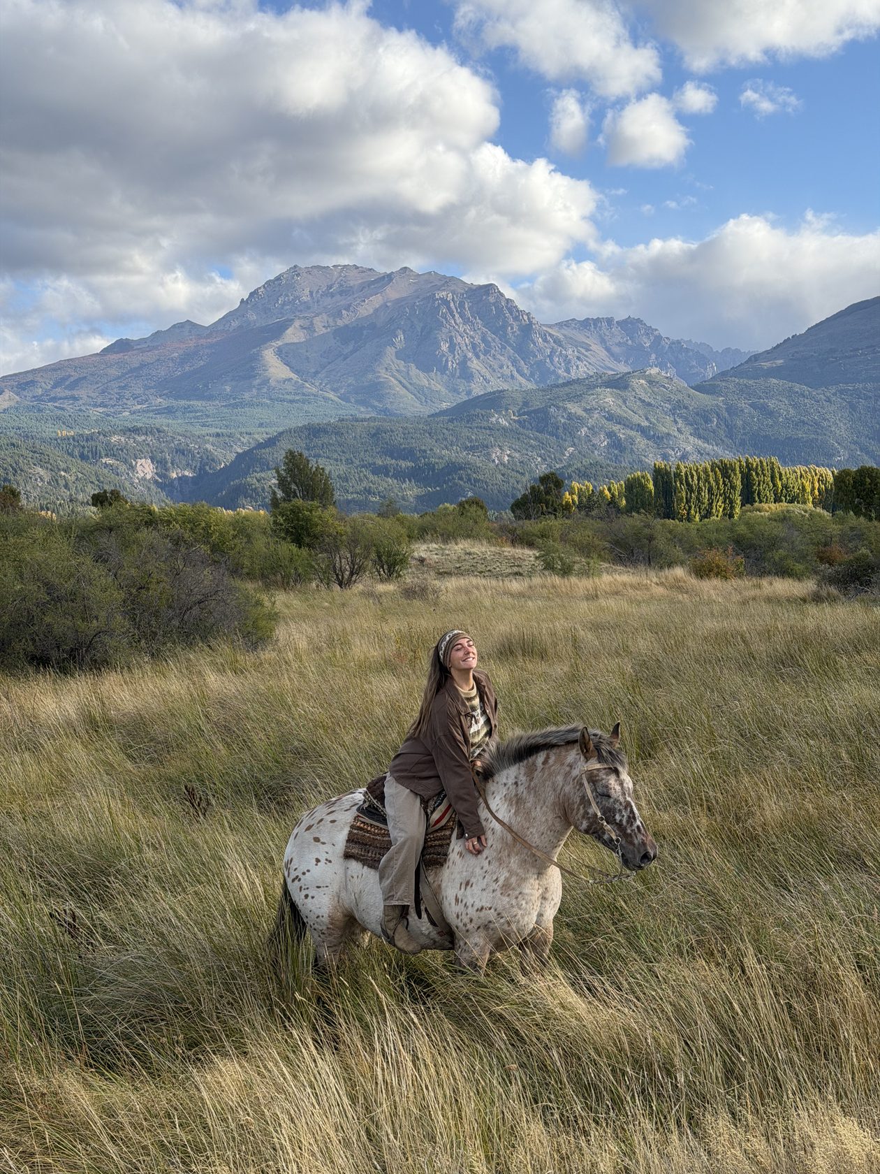 Rider beside a mountain lake, Patagonia