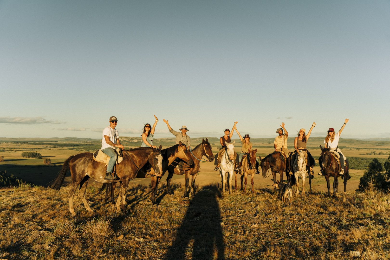 The group on horseback at golden hour, Uruguay